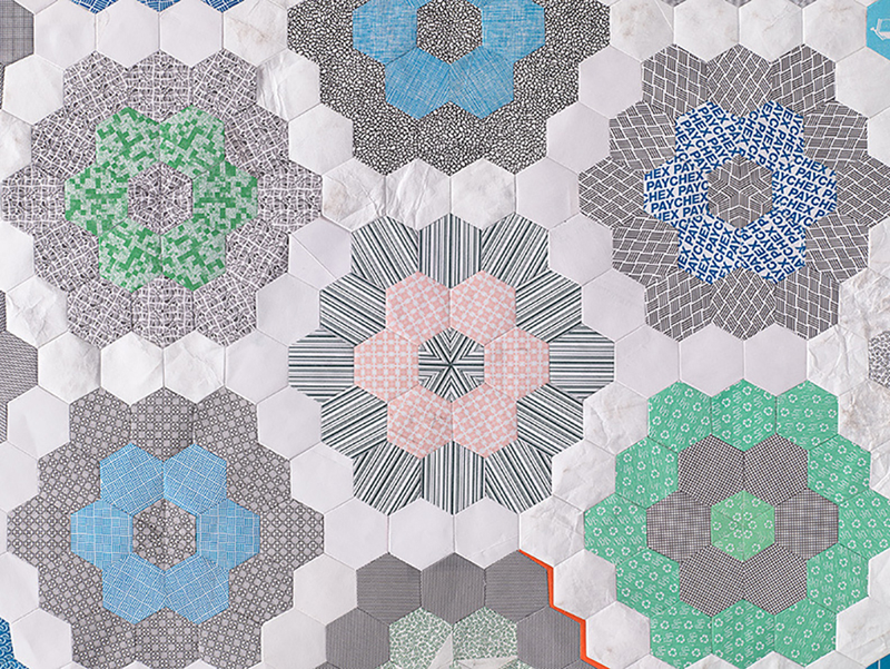 Illustration for article titled You'd Never Guess These Quilts Are Made From 1000s of Envelopes